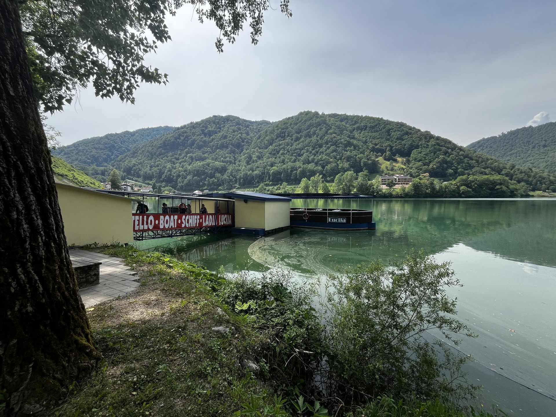 Lucija Boat at the dock in Most na Soči waiting to depart on a tour