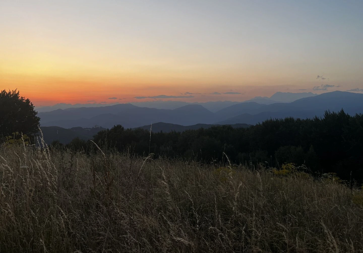 View of sunset glowing over nature from Korada Hill