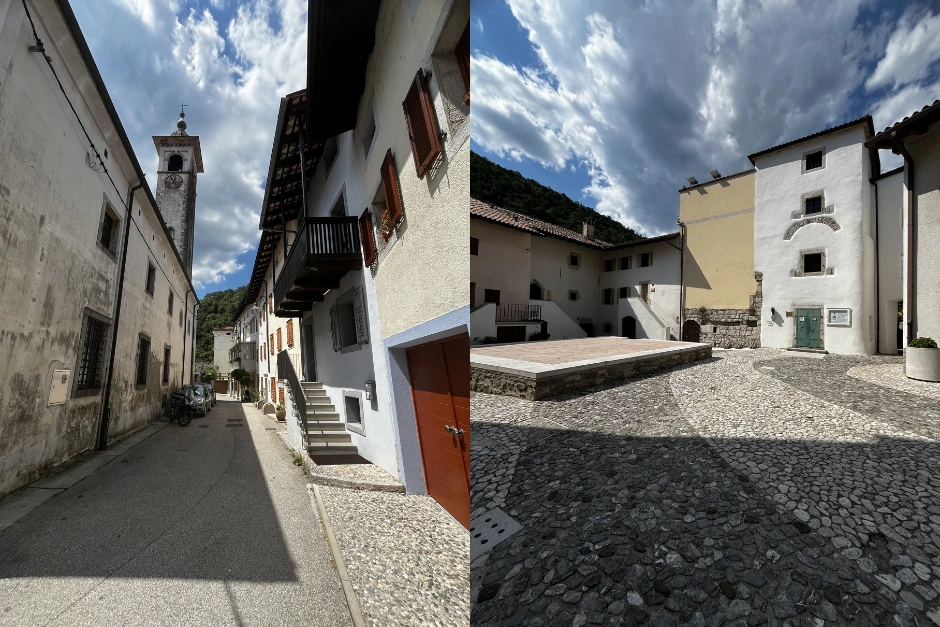 The kontrada square surrounded by old houses and a street in the histroric centre with a church on the left